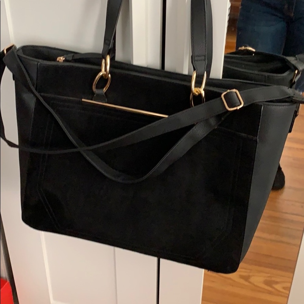 Big black purse with adjustable strap